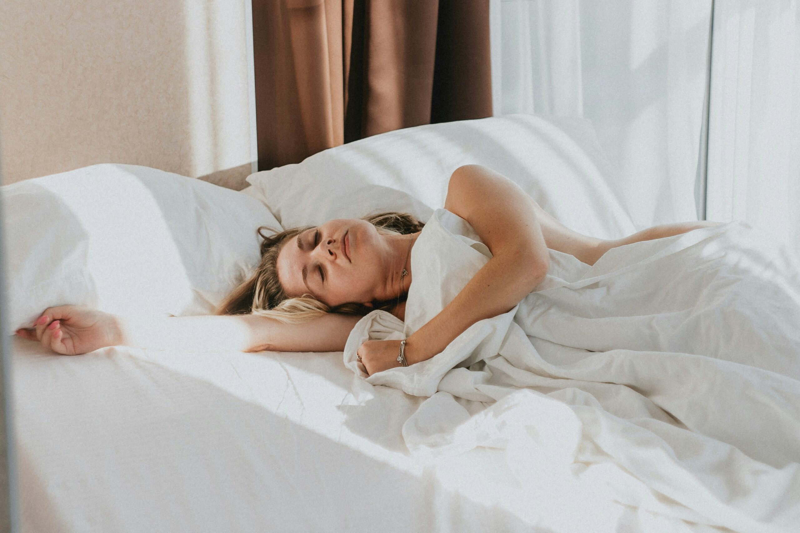 Woman in bed tired after loud snoring